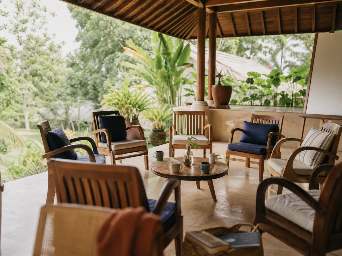 A welcoming circle of chairs in an open-air Bali pavilion